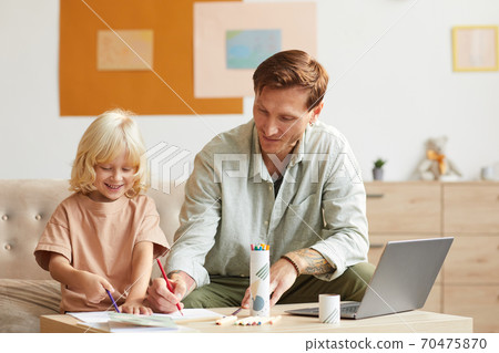 Drawing together with father Drawing together with father 70475870