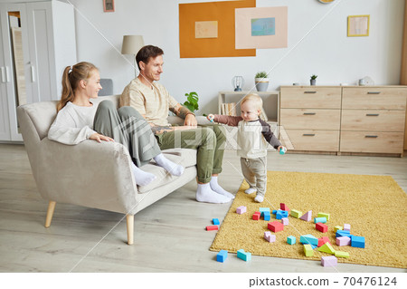 Family of three at home Family of three at home 70476124