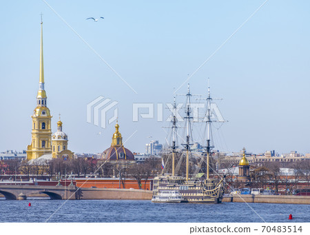 View of the Neva embankment in St. Petersburg, the Petropavlovsk fortress, sailing ship and churches View of the Neva embankment in St. Petersburg, the Petropavlovsk fortress, sailing ship and churches 70483514