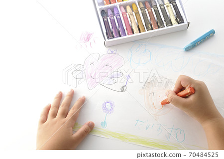 A picture drawn by a right-handed child and a cut of a part of the hand holding a crayon (white background) 70484525