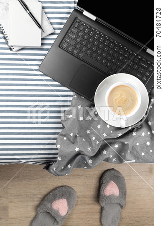 Flat lay top view workspace in cozy bedroom 70484728