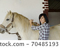Beautiful young girl and white horse 70485193