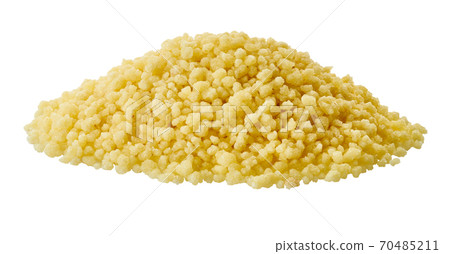 heap of raw couscous with clipping path 70485211