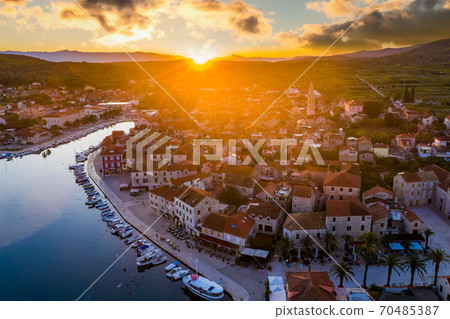 Aerial sunset view of Stari Grad, a town at Hvar island, Croatia. Aerial sunset view of Stari Grad, a town at Hvar island, Croatia. 70485387