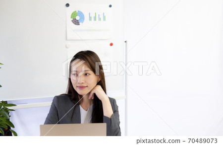 A woman thinking A woman thinking 70489073
