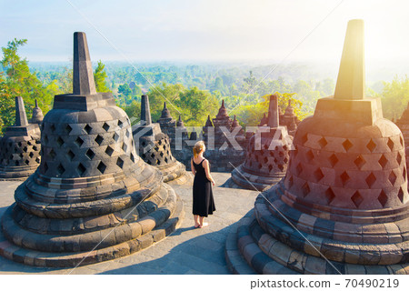 Sunrise in Borobudur, greatest Buddhist temple - Java. Sunrise in Borobudur, greatest Buddhist temple - Java. 70490219
