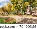 In the courtyard of stalinka building. Orange and green trees, Ukraine, Kharkov 70490386