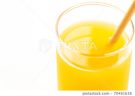 Orange juice with a paper straw. (White background) Orange juice with a paper straw. (White background) 70491638