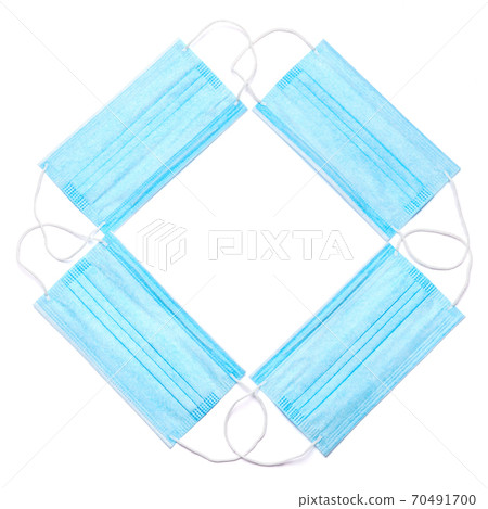 Disposable blue medical face mask isolated on white background with clipping path Disposable blue medical face mask isolated on white background with clipping path 70491700