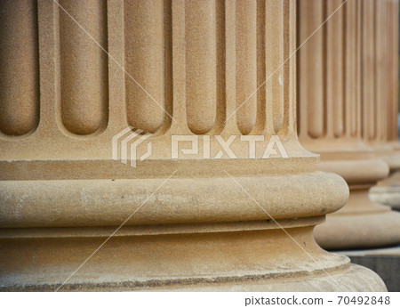 Ancient Pillars Made of Stone Showing Stability and Growth. Ancient Pillars Made of Stone Showing Stability and Growth. 70492848