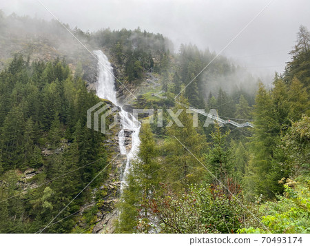 Stuibenfall is dramatic cascade falling 159 meters, Austria. 70493174