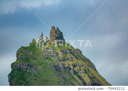 Profile view of top of Tindholmur in Faroe Islands 70493212
