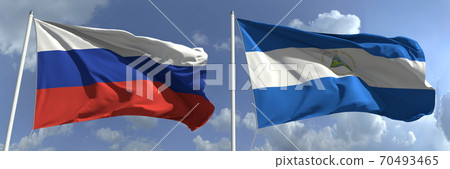Flying flags of Russia and Nicaragua on sky background, 3d rendering Flying flags of Russia and Nicaragua on sky background, 3d rendering 70493465