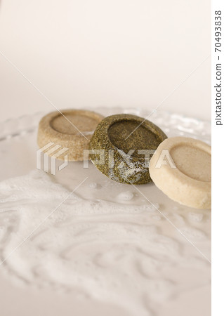 Three soap solid bars on light background. 70493838