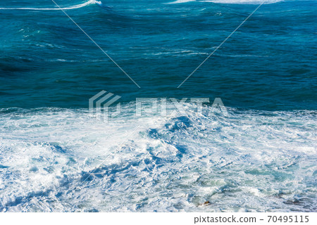 Waves in the blue sea Waves in the blue sea 70495115