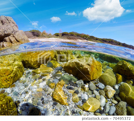 Rocky sea floor in Sardinia Rocky sea floor in Sardinia 70495372
