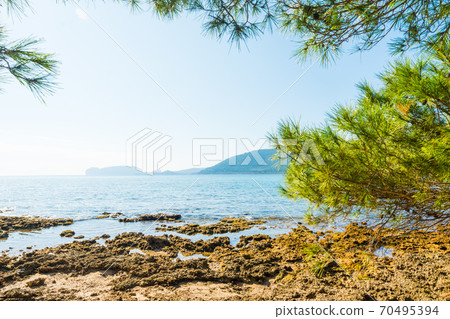 Mugoni shore on a sunny day in summertime Mugoni shore on a sunny day in summertime 70495394