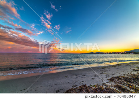 Colorful sunset in Alghero shore 70496047