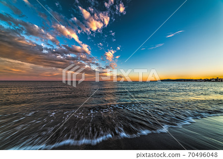 Colorful sunset in Alghero shore 70496048