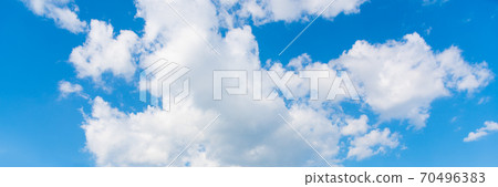 Cumulus clouds and blue sky 70496383