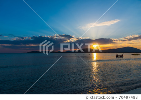 Colorful sky over Alghero coast at sunset 70497488