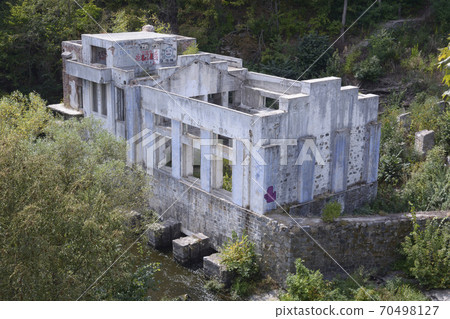 View of an abandoned water power station in the forest. Buksky canyon. Ukraine View of an abandoned water power station in the forest. Buksky canyon. Ukraine 70498127