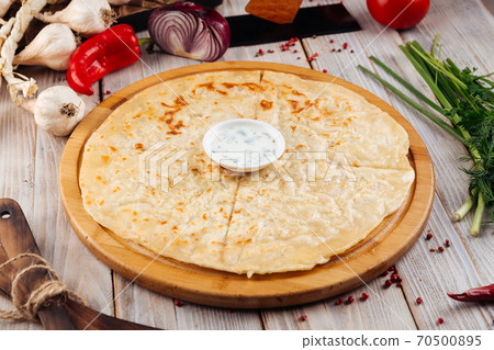 Caucasian traditional thin flatbread khychin Caucasian traditional thin flatbread khychin 70500895