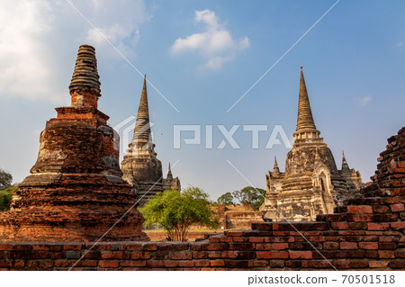 Three pagoda and blue sky in the background as seen at Wat Phra Si Sanphet in Ayutthaya, Thailand 70501518