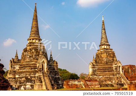 Three pagoda and blue sky in the background as seen at Wat Phra Si Sanphet in Ayutthaya, Thailand 70501519