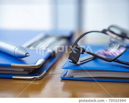 Business image, binder, notebook, glasses Business image, binder, notebook, glasses 70502994