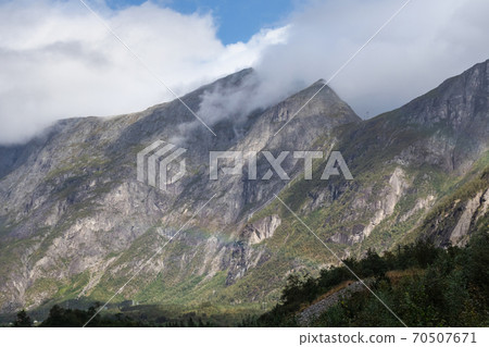 Mountains, clouds view near Andalsnes and Trollstigen in Norway 70507671