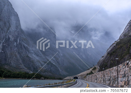Mountains road with tunnel near Andalsnes and Trollstigen in Norway 70507672