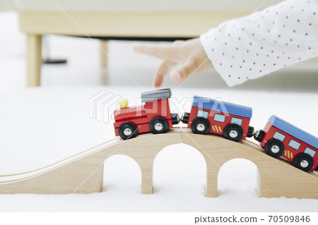 Infants playing with toys Infants playing with toys 70509846