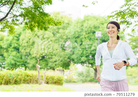 Senior woman jogging Senior woman jogging 70511279