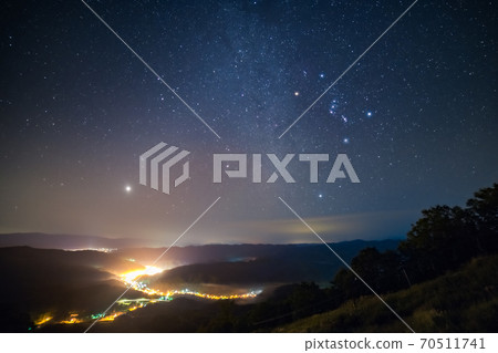 Mt. Kamoe Orion and town lights Mt. Kamoe Orion and town lights 70511741