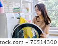 woman washing clothes 70514300