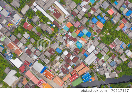 Aerial view of roofs of village houses. Residential buildings in Bangkok Downtown, Thailand. Urban city in Asia. Architecture landscape background. Top view. 70517557