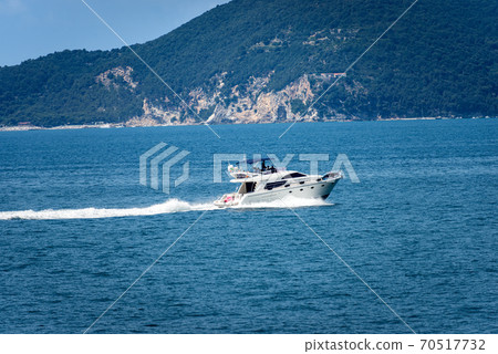 Luxury yacht in motion on the sea - Gulf of La Spezia Italy Luxury yacht in motion on the sea - Gulf of La Spezia Italy 70517732