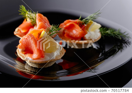 Tartlets with salmon. Tartlets with salmon. 70517784
