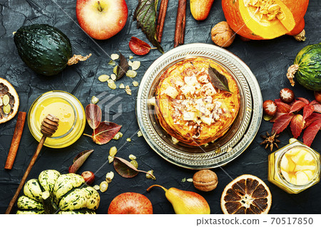 Pumpkin pancakes with syrup Pumpkin pancakes with syrup 70517850