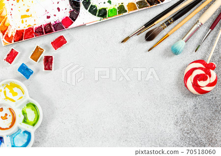 Artist workspace on gray stone background. Artist workspace on gray stone background. 70518060