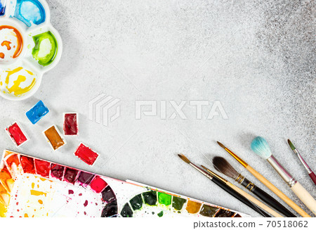 Artist workspace on gray stone background. Artist workspace on gray stone background. 70518062
