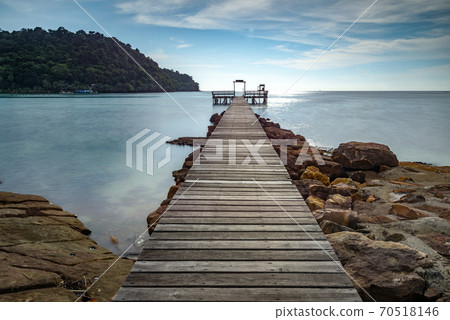 The scenery of a long exposure of the wooden bridge in Koh Kood island, Trat, Thailand. 70518146
