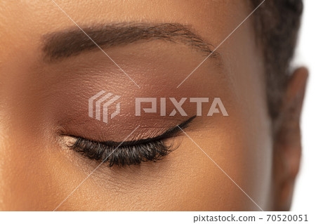 Portrait of beautiful african-american woman isolated on white studio background. Beauty, fashion, skincare, cosmetics concept. 70520051