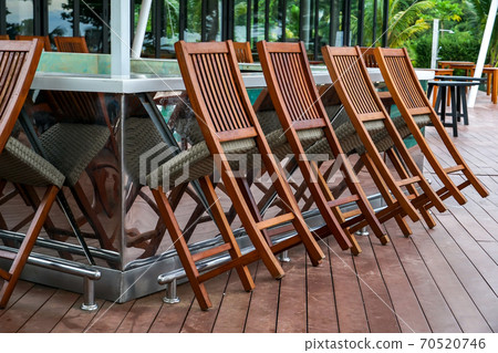brown Table and Chairs in resturant, without visitors. brown Table and Chairs in resturant, without visitors. 70520746