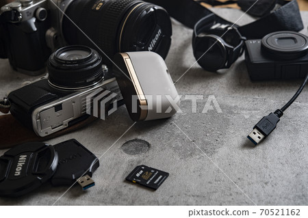 Electronic devices such as digital cameras and smart watches Electronic devices such as digital cameras and smart watches 70521162