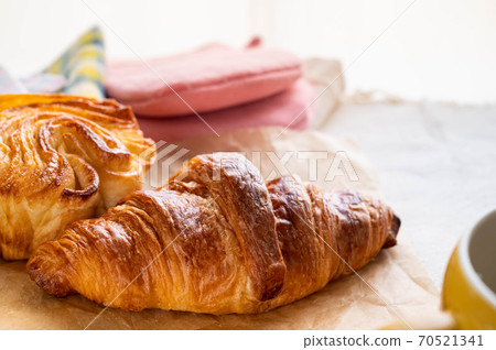 Morning croissant and coffee Morning croissant and coffee 70521341