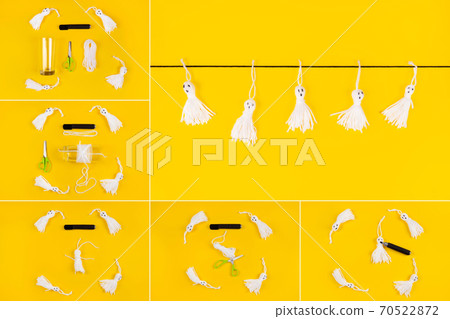 Halloween DIY concept. Make a cute garland of ghosts out of Knitting. 70522872
