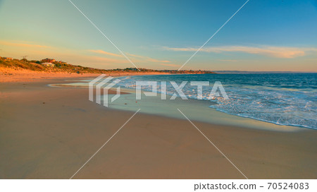 Port Noarlunga beach shoreline at sunset Port Noarlunga beach shoreline at sunset 70524083
