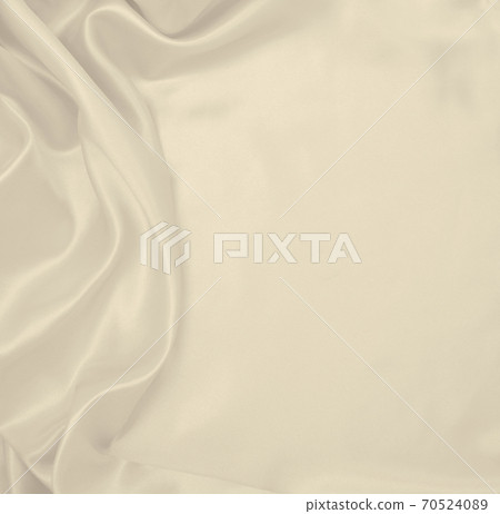 Smooth elegant golden silk or satin luxury cloth texture as wedding background. Luxurious background design. In Sepia toned. Retro style Smooth elegant golden silk or satin luxury cloth texture as wedding background. Luxurious background design. In Sepia toned. Retro style 70524089